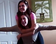 Cherry and Sarah lift each other